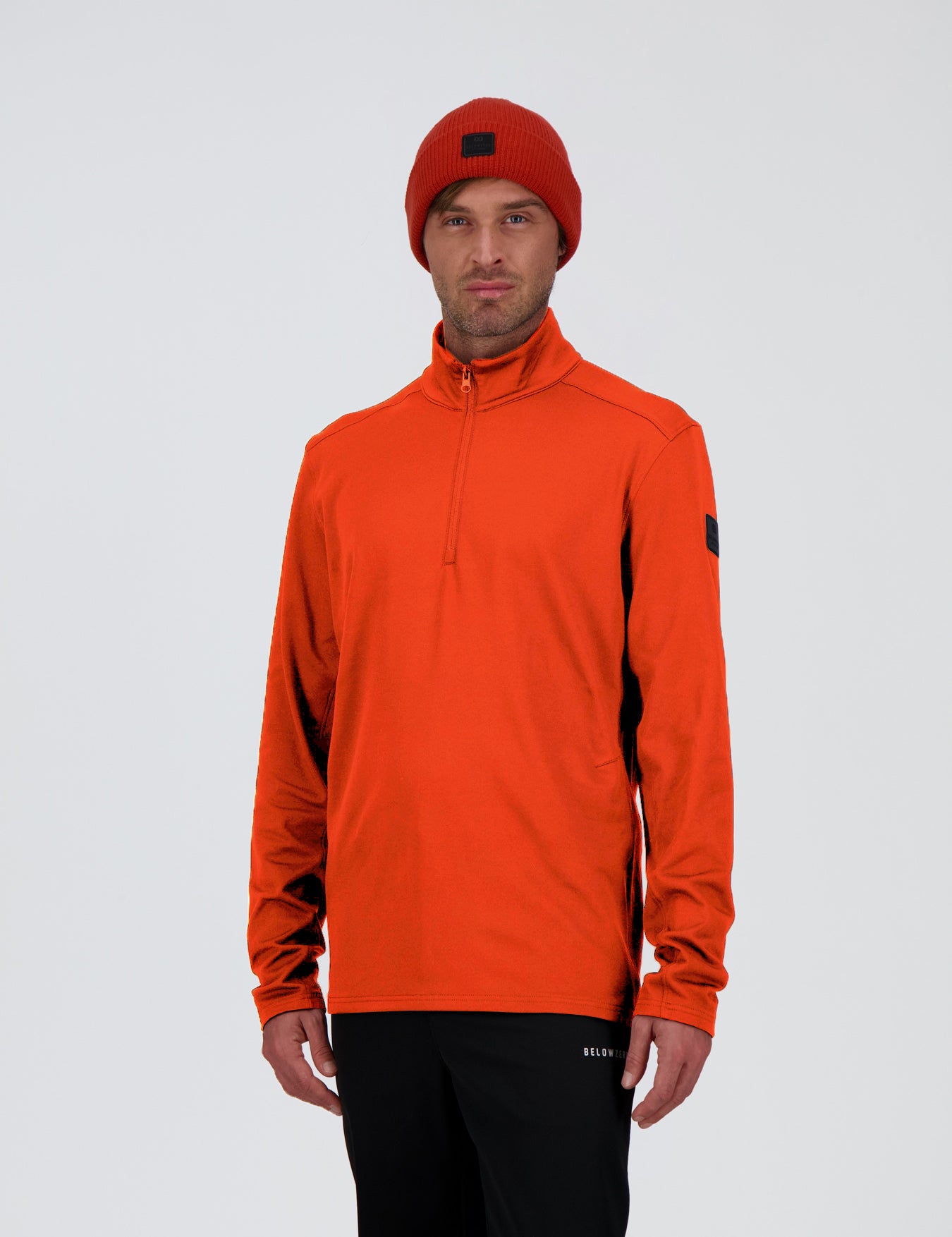 Frontansicht des orangen sportlichen Herren Halfzip Shirts Wangs von Belowzero